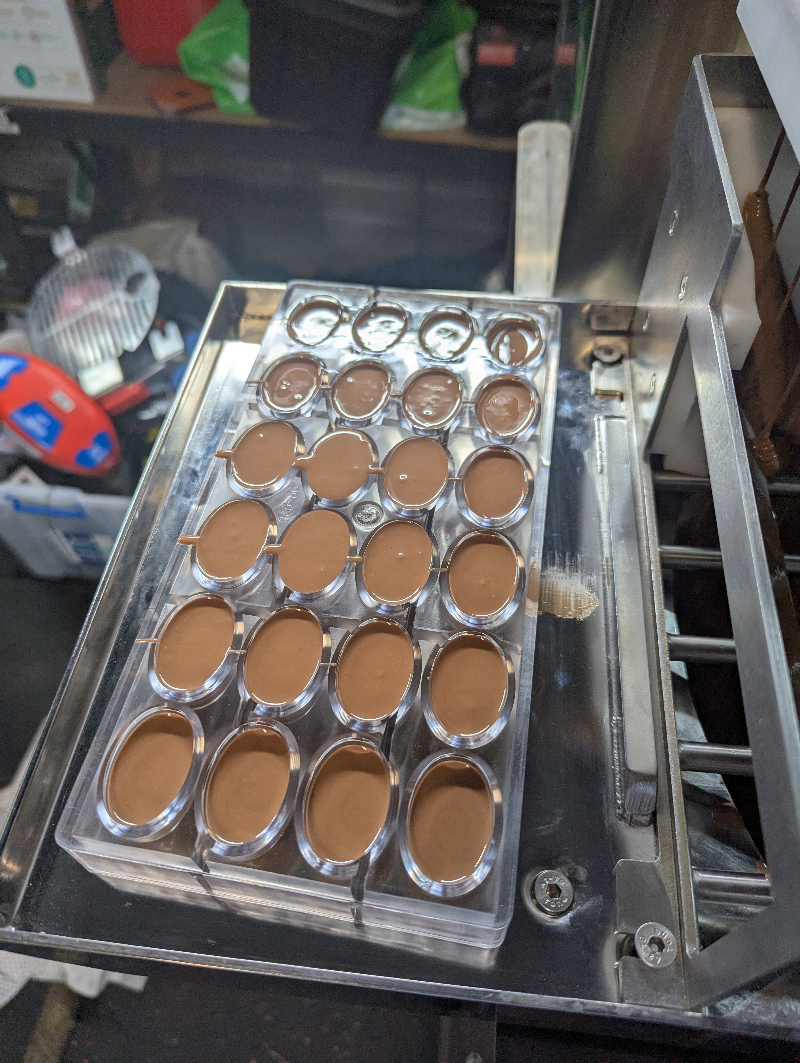 Chocolate moulds being filled during MochaMelts product development